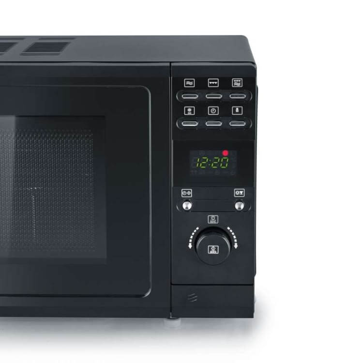Mesh screen in a microwave door