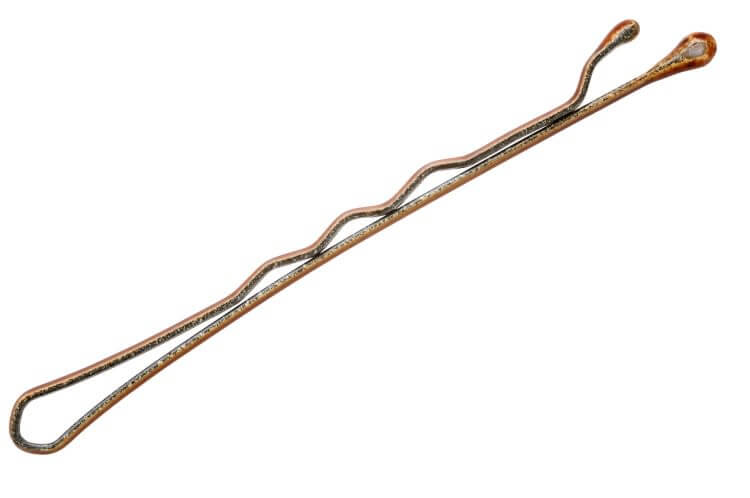 Bobby pin with a wavy side