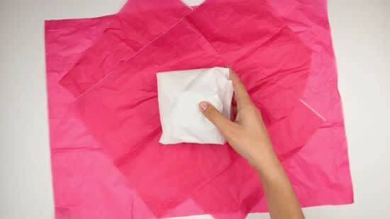 Packing clothes with tissue paper
